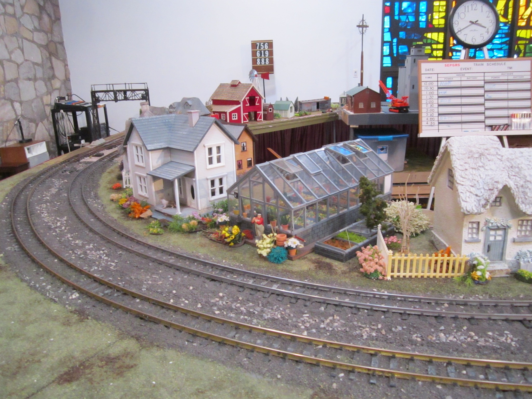 Village scene with greenhouse